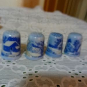 Vintage Courier and Ives porcelain thimbles